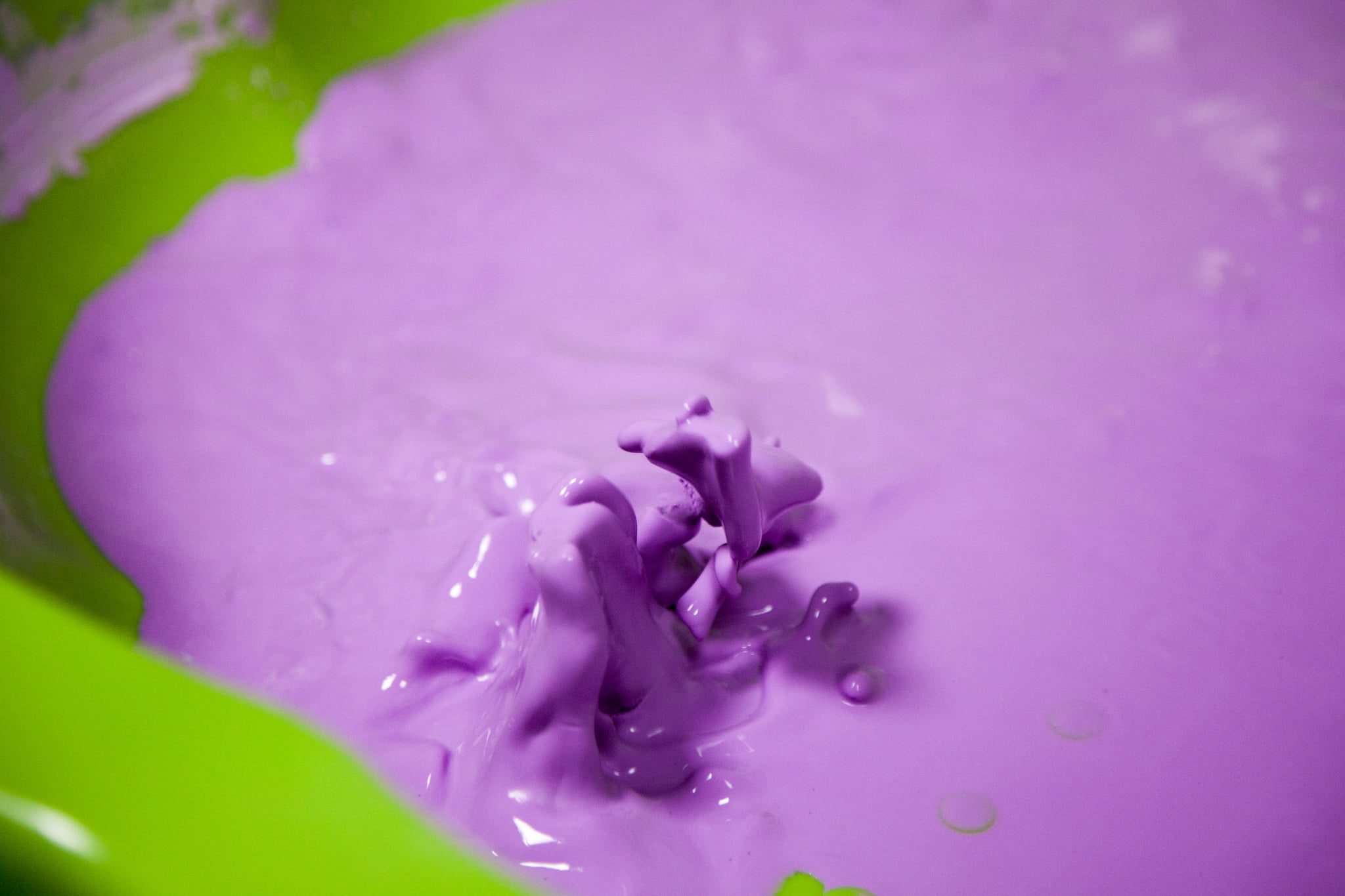 Purple-colored oobleck, a suspension of water and cornstarch.