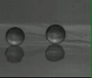 Growing Droplets on a Trampoline