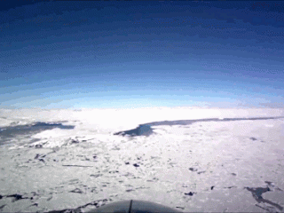 GIF of flying over an ice field
