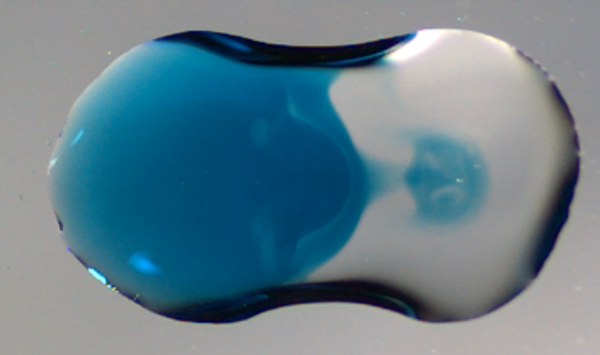 Surface Jets in Coalescing Droplets