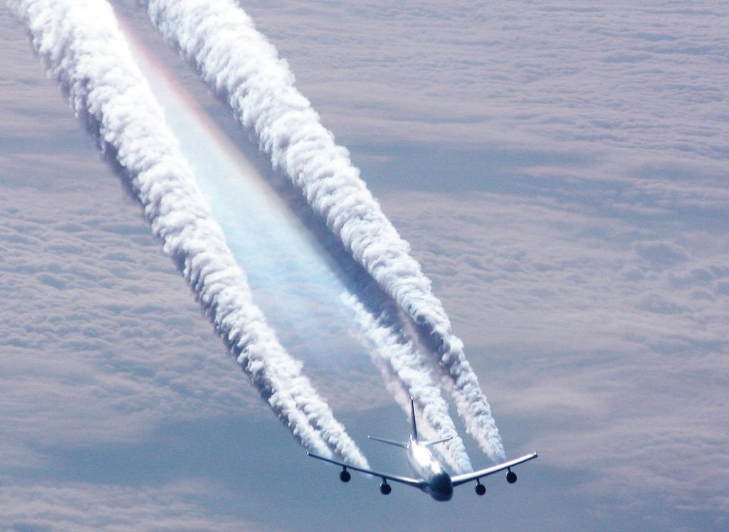 A view from above of contrails from a 4-engine aircraft wrapping up. Photo by Josef Willems. A view from above of contrails from a 4-engine aircraft wrapping up. Photo by Josef Willems.