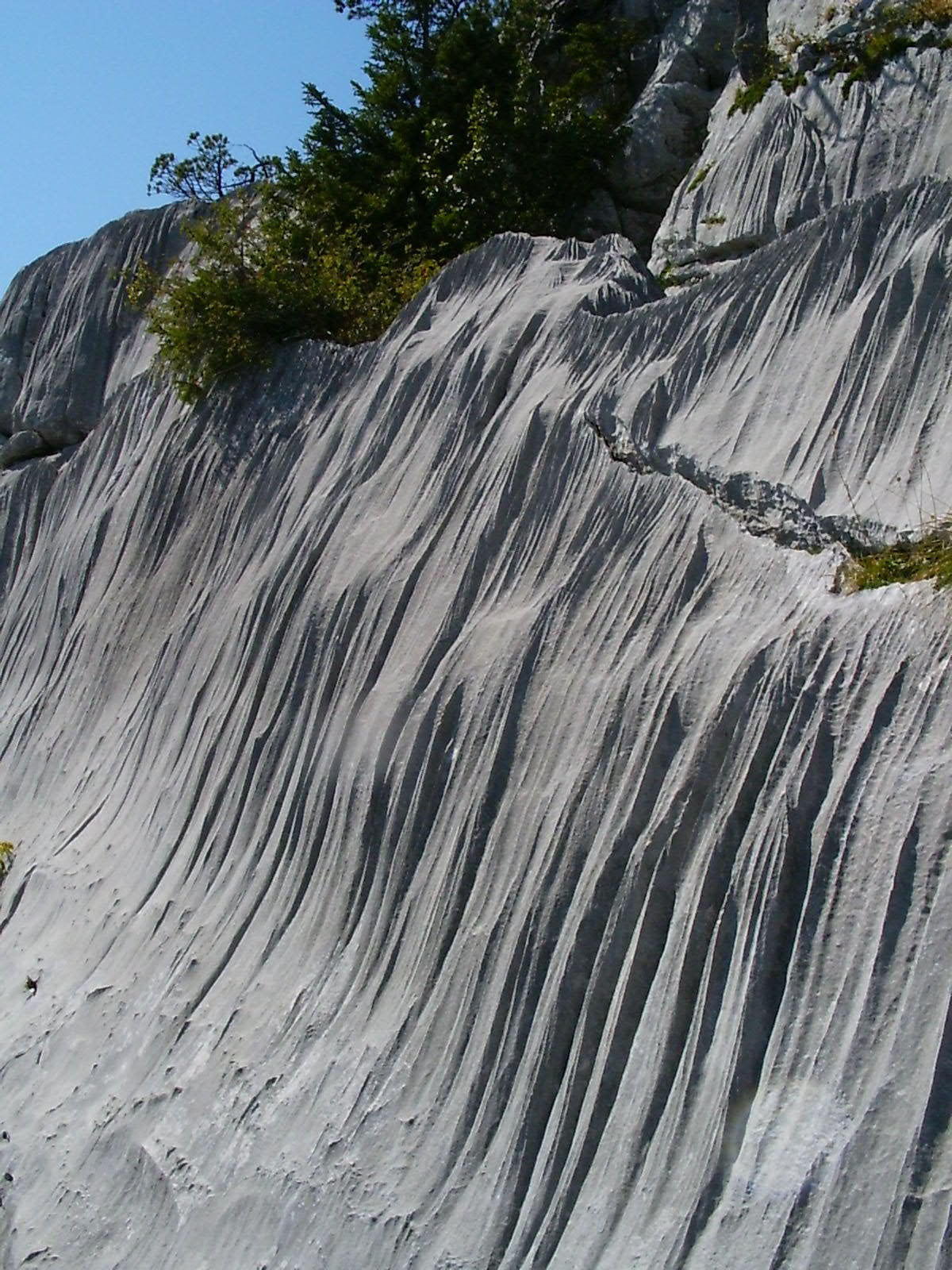 Long, parallel grooves called rillenkarren can form in limestone and gypsum.
