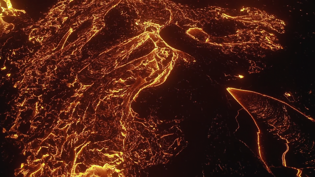 Streams of lava glow in the dark.