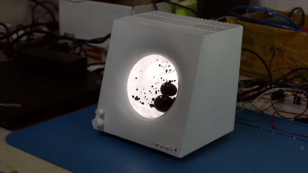 Visualizing music with a ferrofluid speaker. Visualizing music with a ferrofluid speaker.