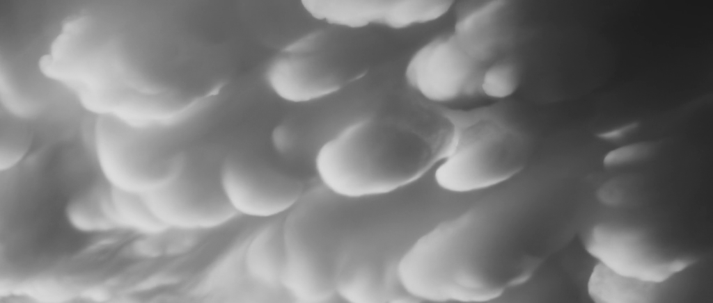 Monochrome mammatus clouds. Monochrome mammatus clouds.