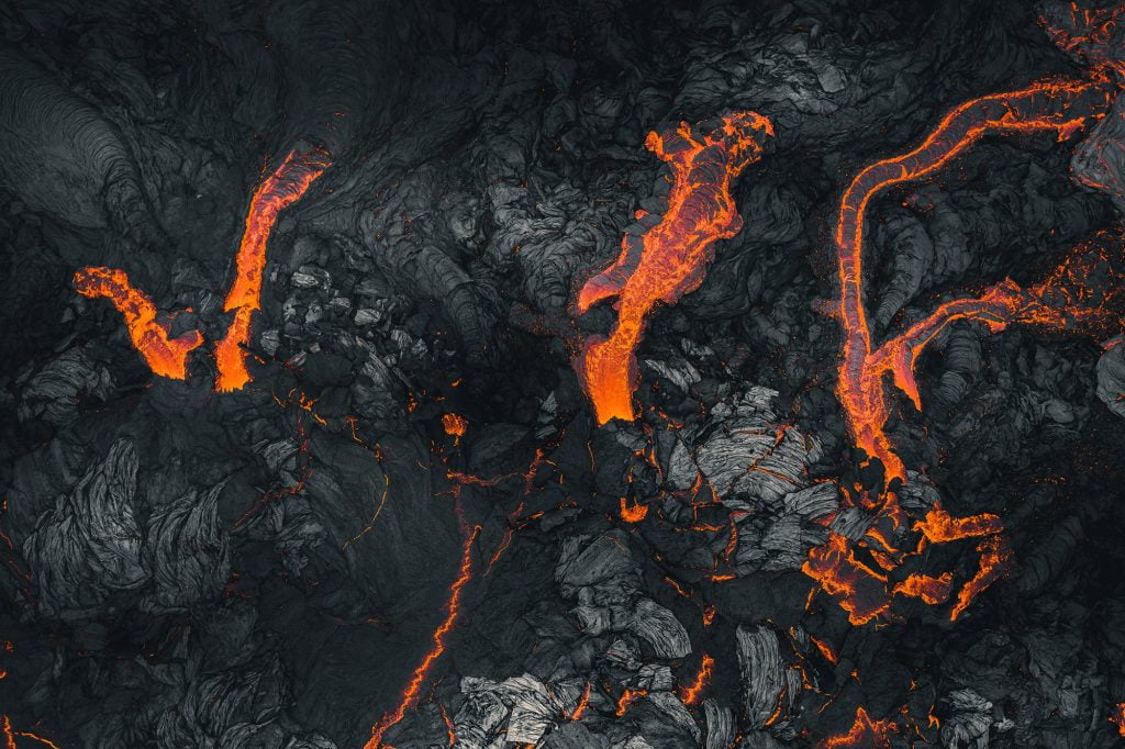 Rivulets of lava flowing and cooling. Rivulets of lava flowing and cooling.