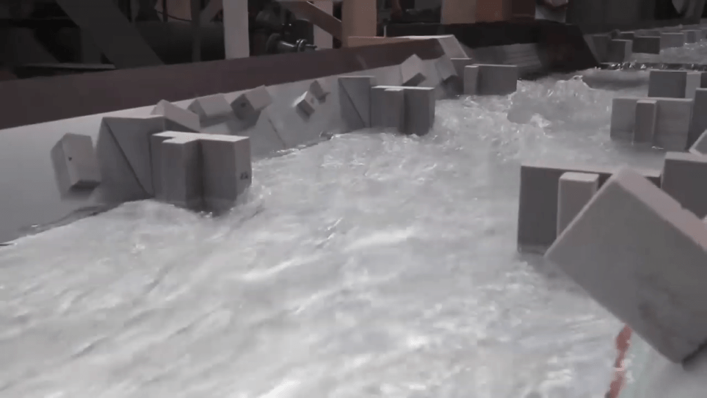 To test the canoe slalom's design, researchers built a scale model. To test the canoe slalom's design, researchers built a scale model.