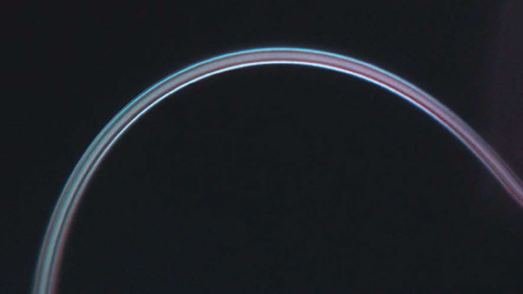 A tiny thread of ice, shown under a microscope, can bend and flex without breaking.