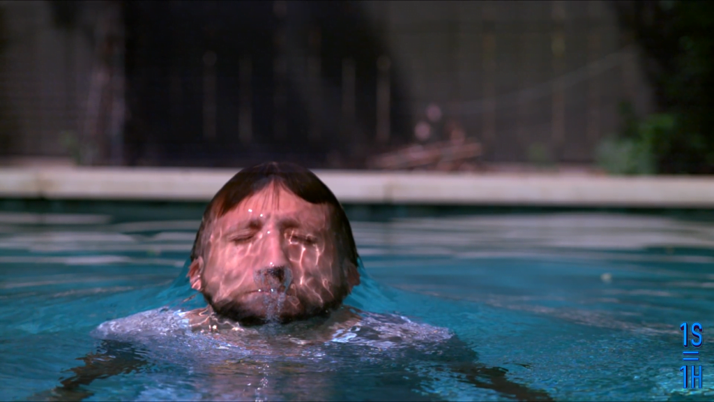 Surface tension distorts Gav's face as he comes out of the pool. Surface tension distorts Gav's face as he comes out of the pool.