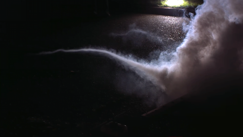 Viewed from the side, the aircraft's wingtip vortices are strong enough to draw in a meter or so of fog. Viewed from the side, the aircraft's wingtip vortices are strong enough to draw in a meter or so of fog.