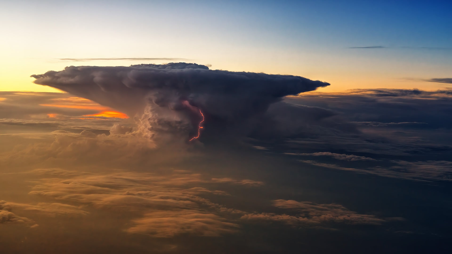 The anvil cloud of a thunderstorm.