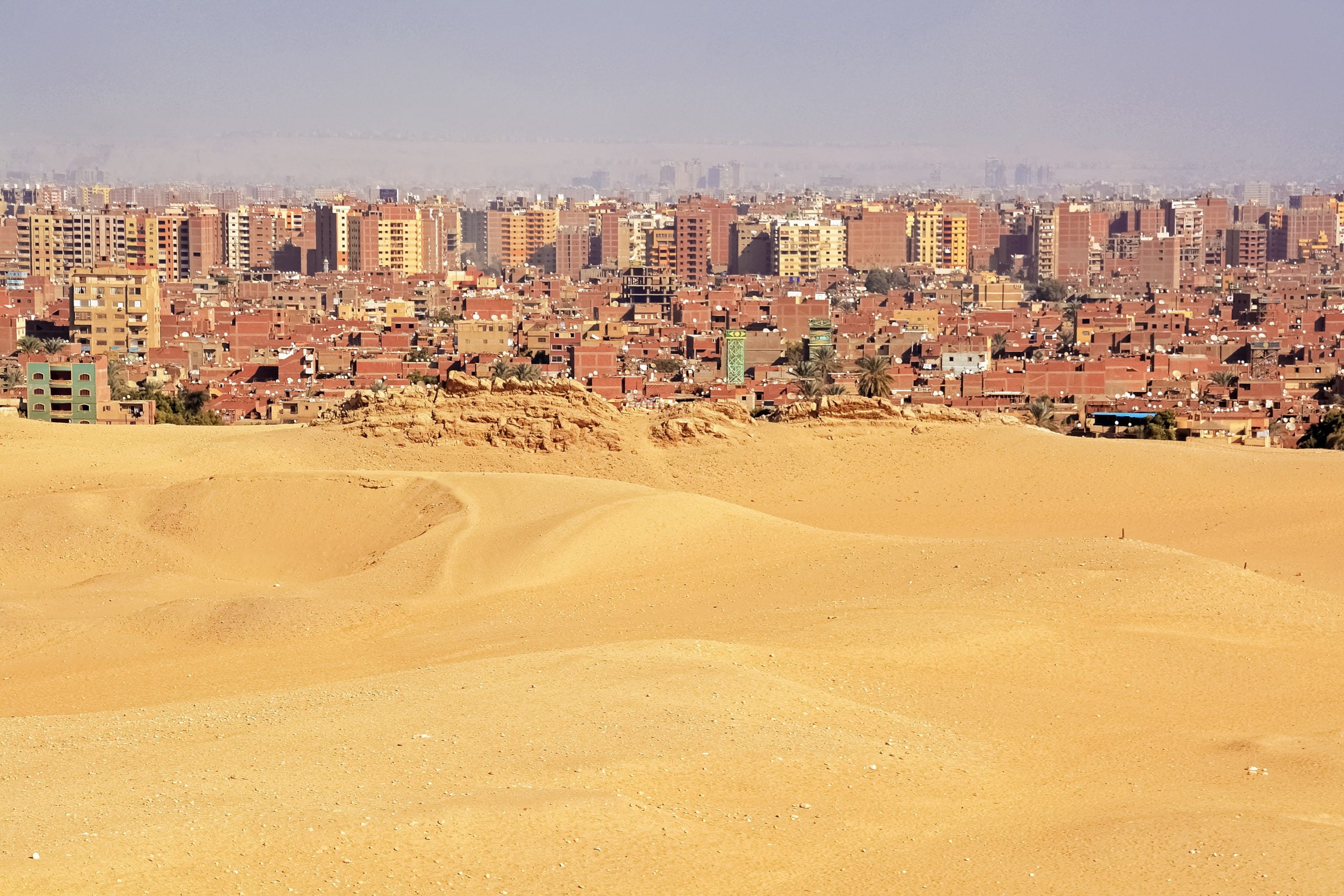 Migrating dunes often encounter obstacles, both natural and manmade.