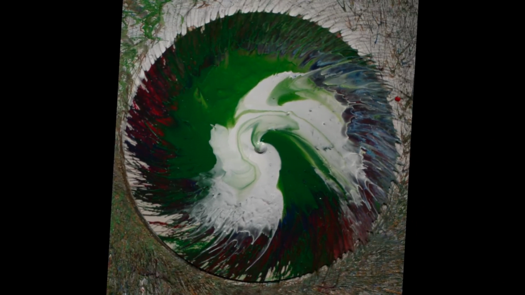 Paint flung from a spinning disk. Paint flung from a spinning disk.