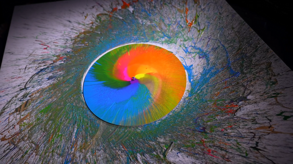 Paint flung from a spinning disk. Paint flung from a spinning disk.