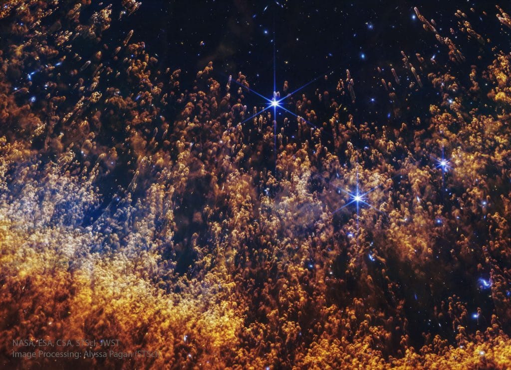 Cometary knots in the Helix Nebula, as viewed in infrared light by JWST.