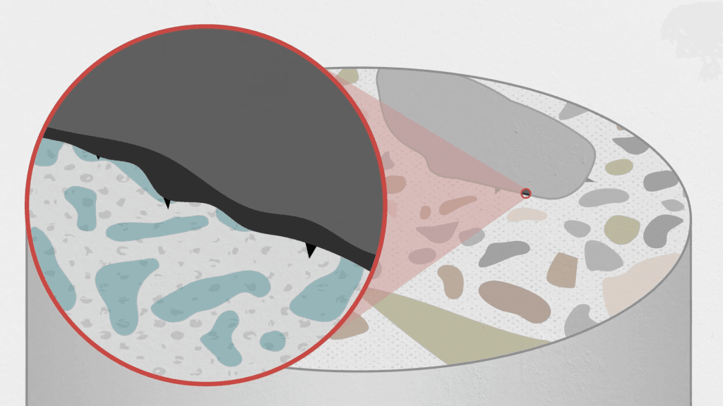 Illustration showing an alkali-silica reaction expanding the size of an aggregate in concrete.