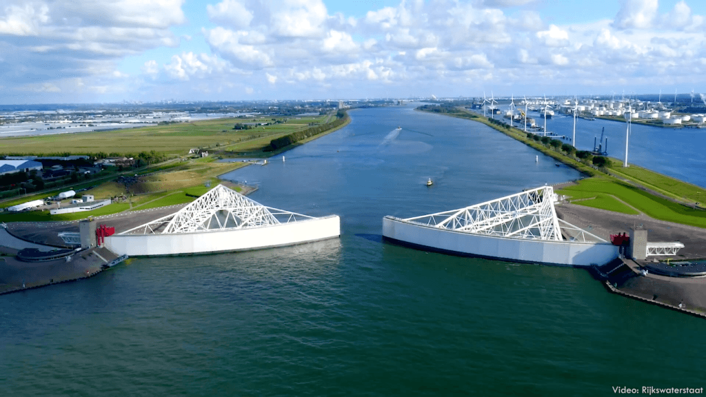 The Maeslantkering uses giant gates to block storm surge into the Rhine. The Maeslantkering uses giant gates to block storm surge into the Rhine.