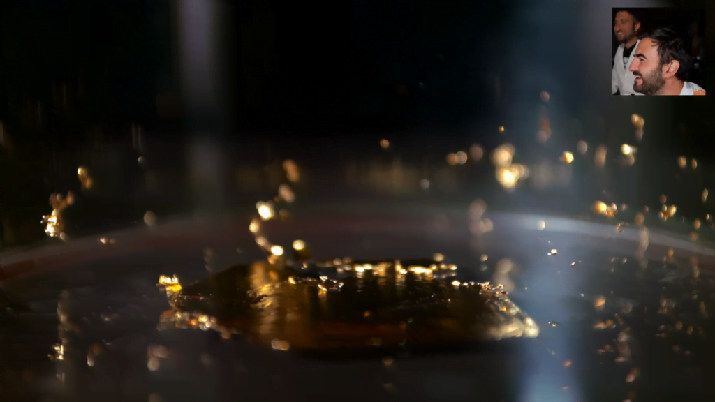 Foil on the bottom of the chamber rips from the edges inward.