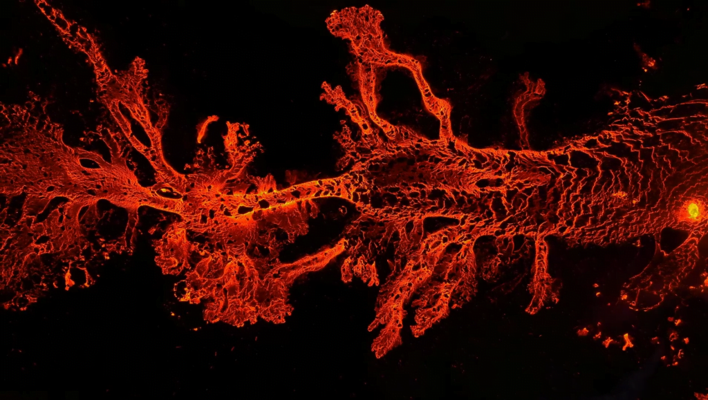 Drone footage of a recently opened fissure in an Icelandic volcano field. Drone footage of a recently opened fissure in an Icelandic volcano field.