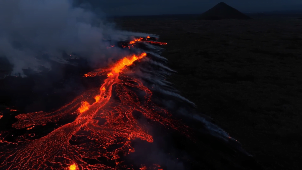 Drone footage of a recently opened fissure in an Icelandic volcano field. Drone footage of a recently opened fissure in an Icelandic volcano field.