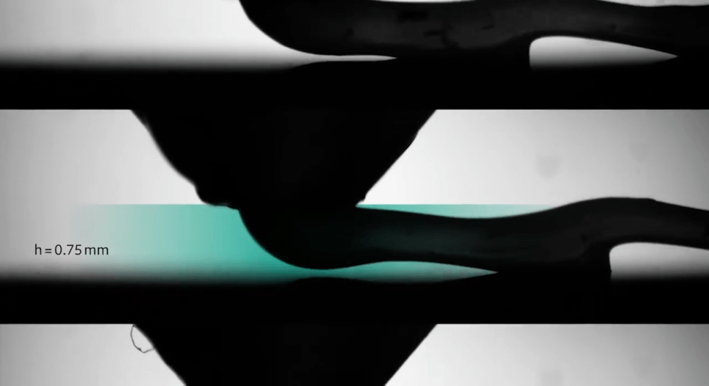 Three stacked images showing under-extruded 3D printing.