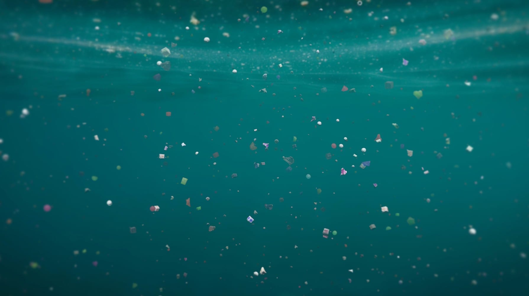 Artist's conception of microplastics floating in the water.
