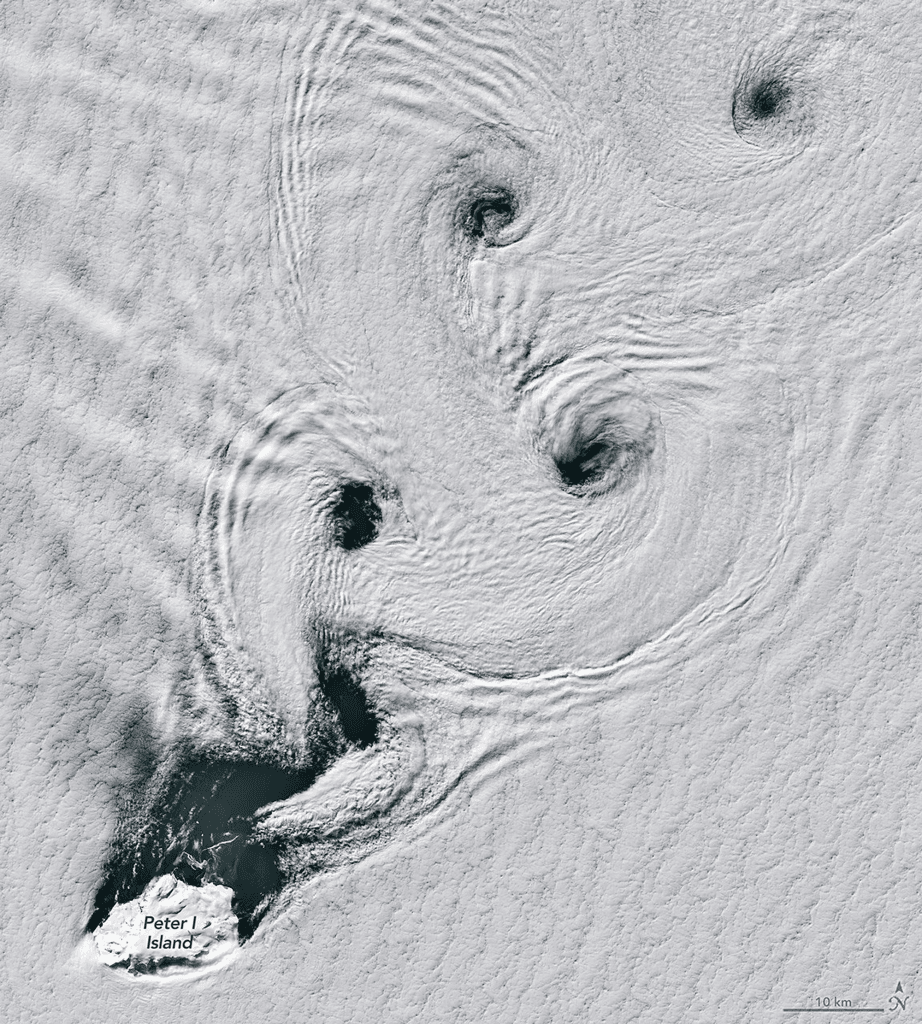 A von Karman vortex street stretches downstream from Peter I Island.
