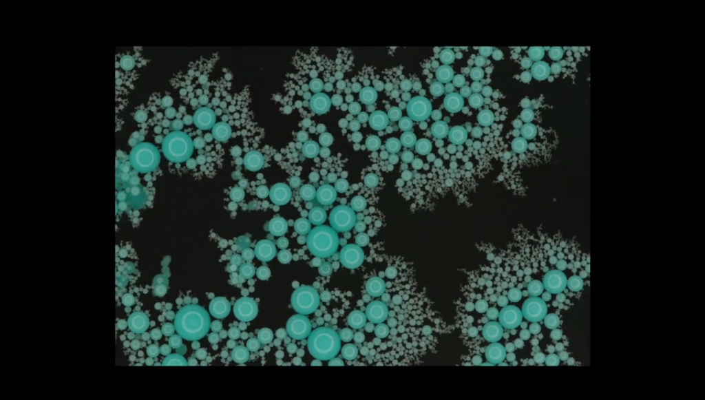 Once the top is removed, the particles float up and form fractal rafts. Once the top is removed, the particles float up and form fractal rafts.