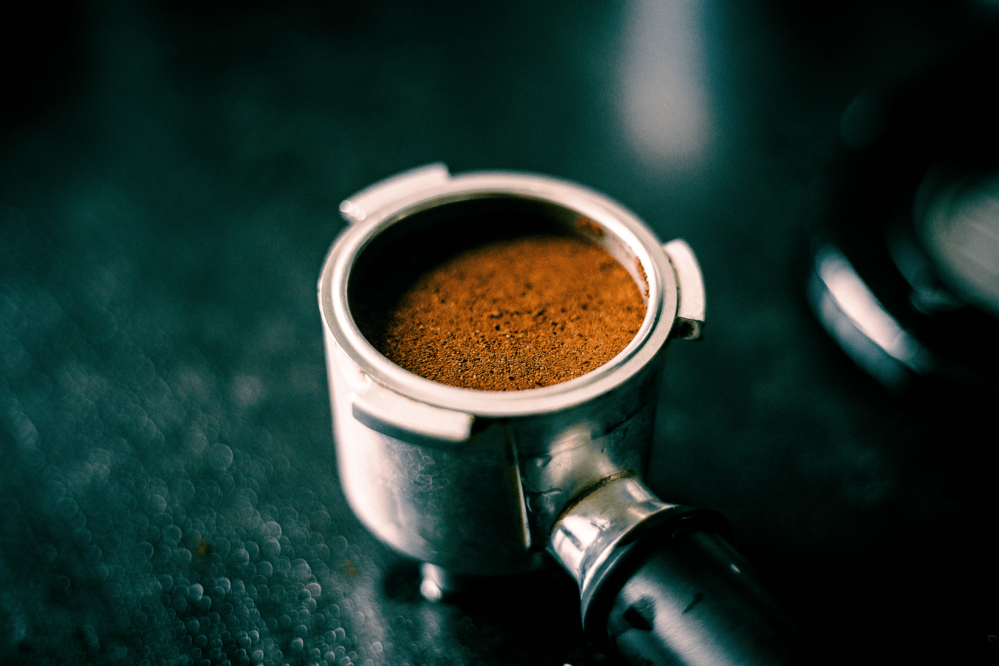 An espresso bed, or puck, used to brew a shot.
