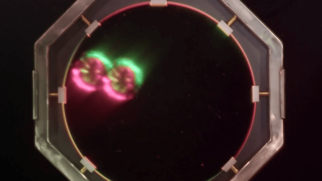 A vortex ring made of carbon dioxide--and its reflection.