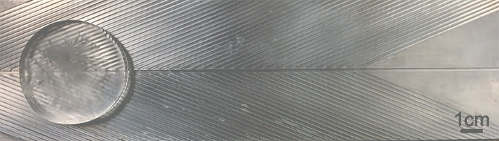 Animation of an ice disk spontaneously slingshotting off a superhydrophobic herringbone surface.