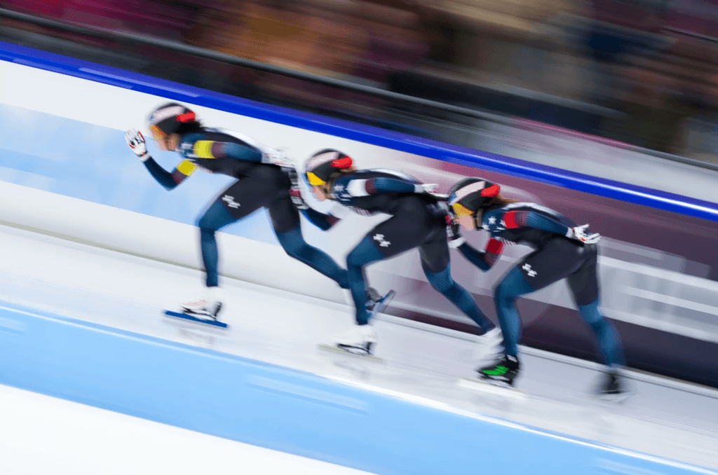 U.S. Team Pursuit speed skaters in competition. Photo by Peter Dejong/AP.