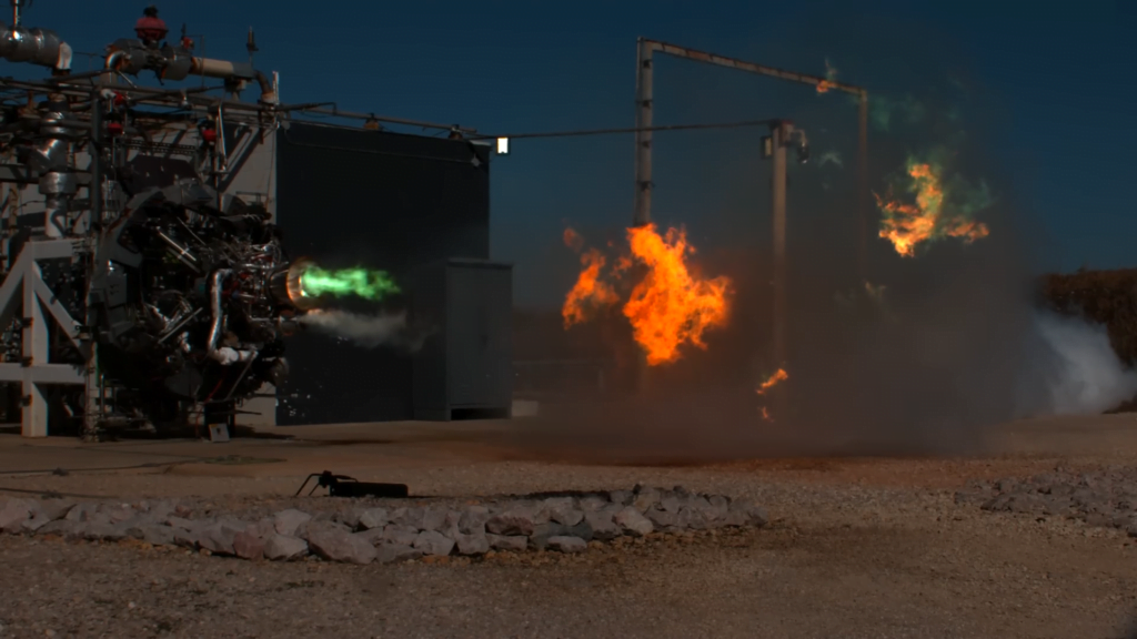 Initial propellant burns green as the rocket starts. Shock waves move bursts of flame in the rocket's exhaust. Initial propellant burns green as the rocket starts. Shock waves move bursts of flame in the rocket's exhaust.