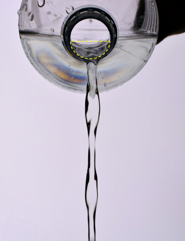 Water poured from a non-circular hole takes on a chain-like shape.