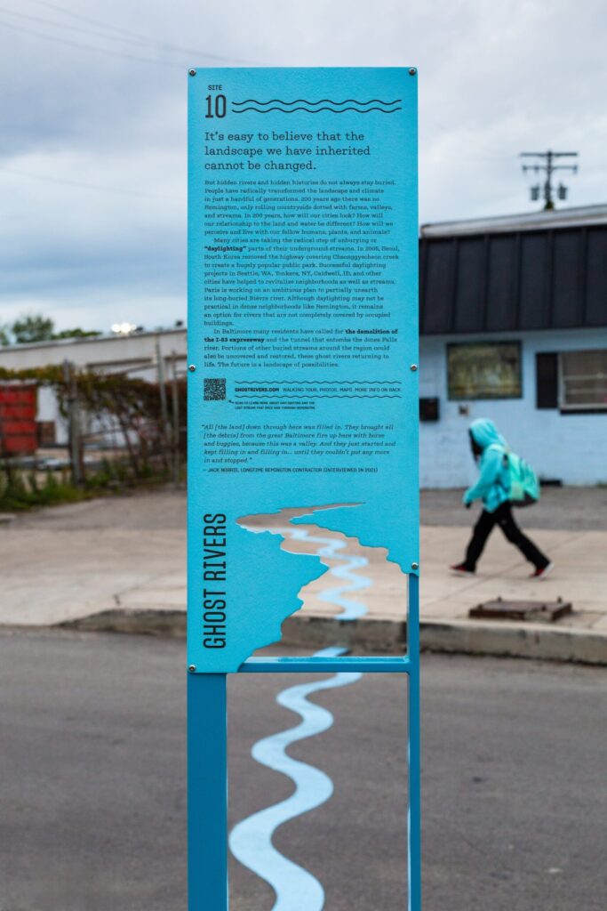 A road sign explaining the ghost river that runs beneath the current development. A road sign explaining the ghost river that runs beneath the current development.