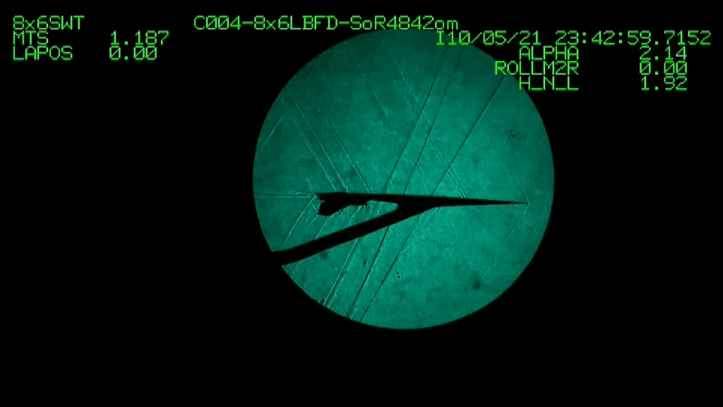 Schlieren image of a model X-59 tested at supersonic conditions in a wind tunnel.