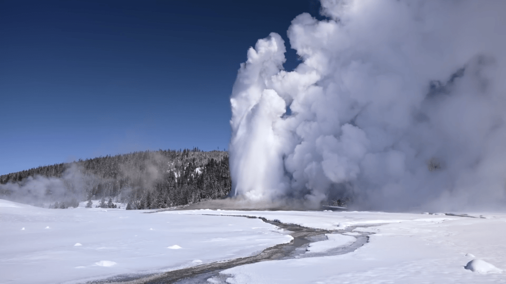 A geyser sends up a plume of steam. A geyser sends up a plume of steam.